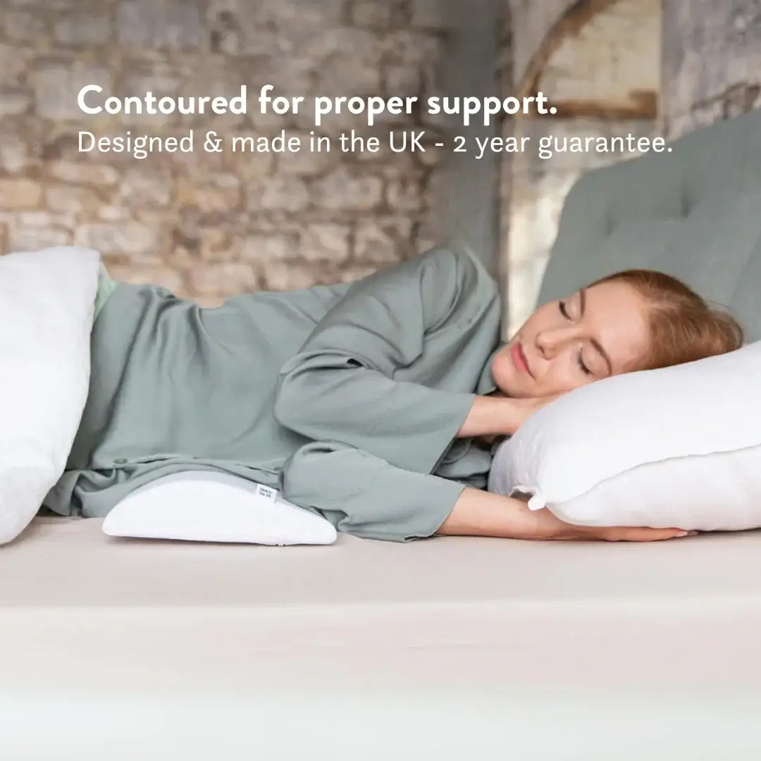 Person lying on a bed with a contoured pillow, text about support and product details.