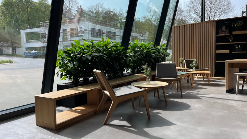 a room filled with furniture and a large window