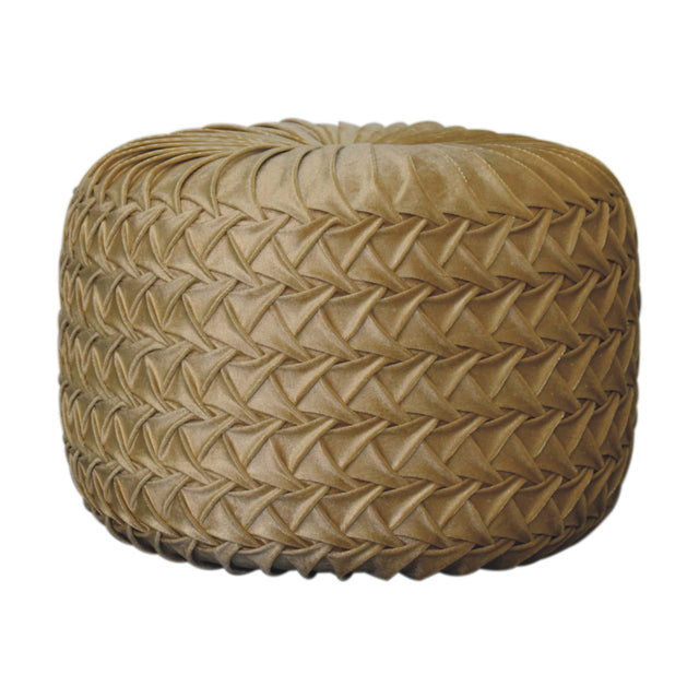 Round ochre pouffe with a pleated fabric cover.