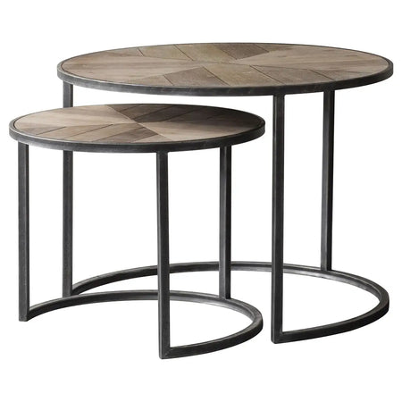 Nesting round tables with patterned wood tops and metal frames.