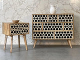 Wooden furniture set with honeycomb drawer fronts.