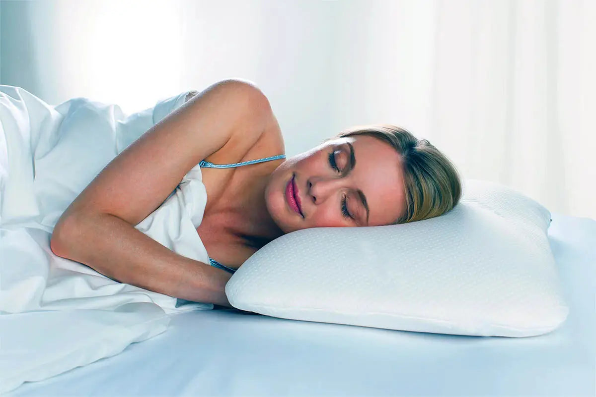 Ergonomic white pillow.