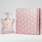 Pink perfume bottle and packaging with 'Gold Coast' branding on a white background