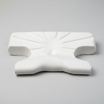 Contoured CPAP Pillow with C-Shaped Cut-Outs for Mask Users