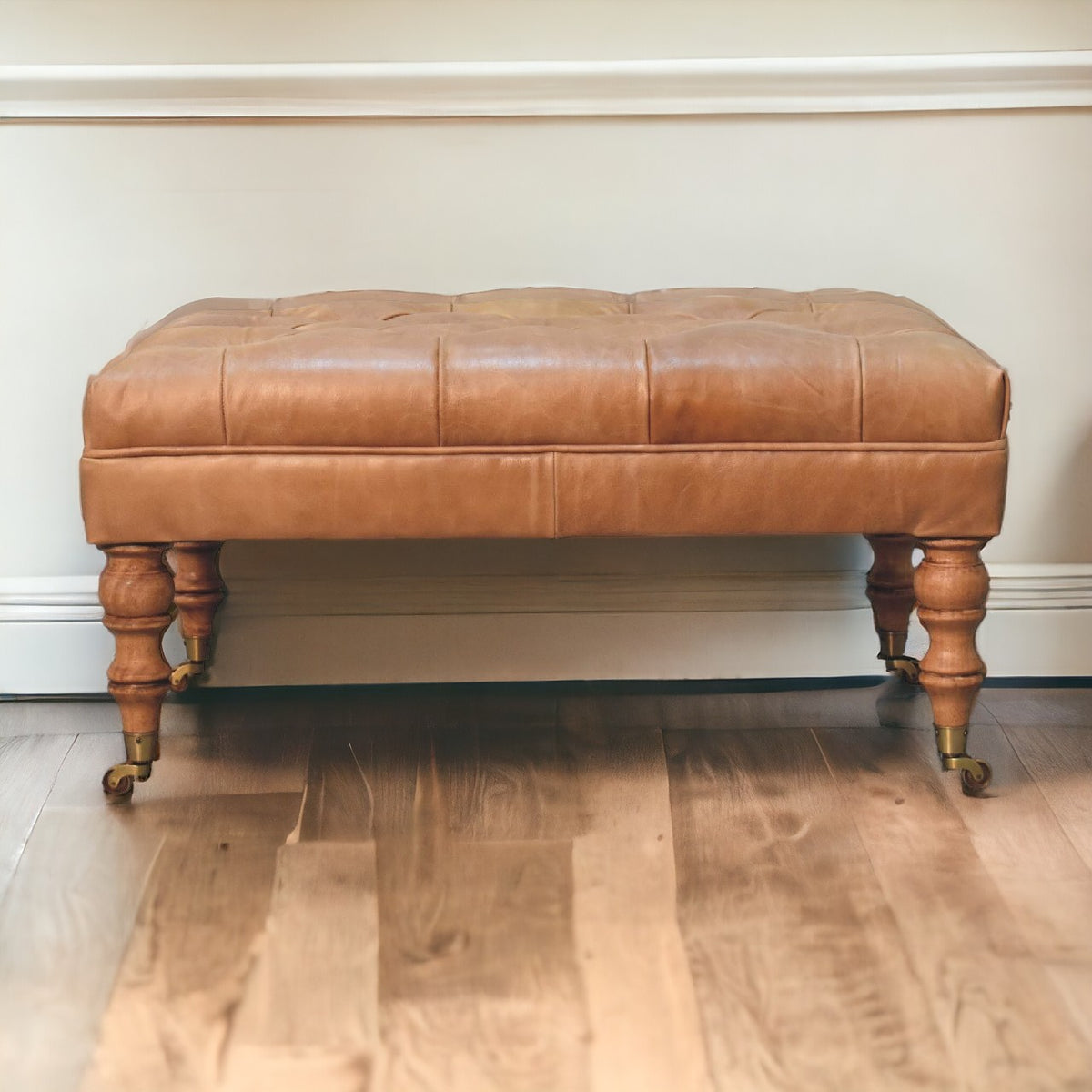 Buffalo Tan Leather Ottoman with Castor Legs Storage Bench