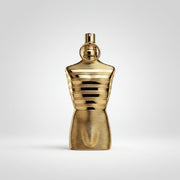 Gold perfume bottle on a white background