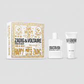 Zadig & Voltaire Happy Paris body set including a white and gold gift box, a clear spray bottle, and a white body cream tube on a white background.