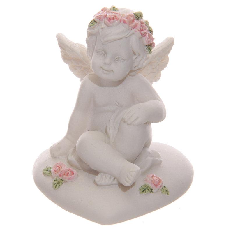 Collectable Cherub Sitting on Heart with Pink Roses-