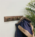 Four Bee Design Coat Knobs On A Wooden Base-Coat Hooks