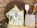 Two Fabric Pot or Pan Mats With Contemporary Green Leaf Print Design-Decorative Kitchen Items
